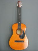 An acoustic guitar by Hi-Spot