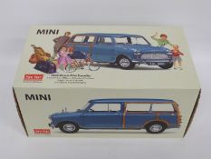 Sun Star 1:12 scale diecast model limited edition 1960 Morris Mini Traveller, in original box.