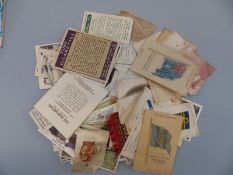An assortment of cigarette and tea cards to include railway engines & cricketers,
