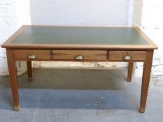 A 20thC Ministry or similar desk, marked GR with crown to locks,