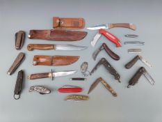 A collection of pocket knives to include Army clasp and pruning examples,