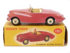 Dinky Toys diecast model Sumbeam Alpine Sports with red body, cream interior and cream ridged hubs,