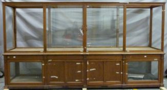 Ex Victoria & Albert Museum early 20thC mahogany four bay glass display cabinet with glazed upper