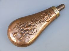 James Dixon & Sons copper and brass powder flask with embossed decoration of guns, game birds,
