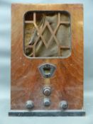 An Art Deco wireless in wooden cabinet with Bakelite knobs,