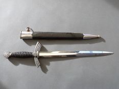 A Nazi Luftwaffe style dagger with leather covered handle and 31cm blade,