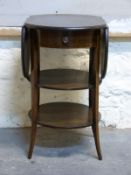 A late 19th/early 20thC occasional table formed as three circular leaves with line inlaid