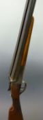 Miguel Larranaga 12 bore side by side shotgun double trigger, chequered grip and forend,
