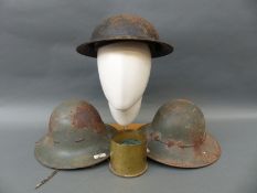 Three military helmets, two stamped BMB,
