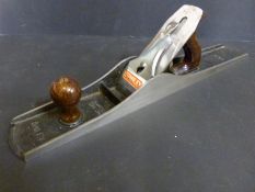 A boxed Stanley No 7 plane,