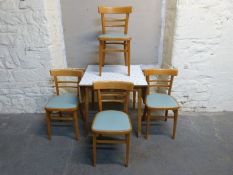 A modern oak extending dining table max L180 min 90, W90,
