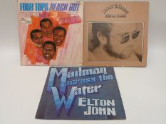 A collection of vinyl, mixed genres to include Elton John, Stevie Wonder,