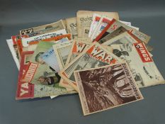 Thirty five WWI and WWII era military magazines and papers, British, German, French,