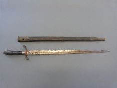 A 19thC possibly French or German hunting sword with lion's head to quillon and horn handle,