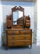 A late 19thC walnut dressing table with bevelled mirror and cast bronze / brass handles W106 x D46