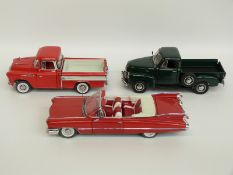 Three Danbury Mint diecast model vehicles comprising 1959 Cadillac Series 62,