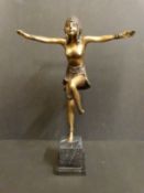 A bronzed Art Deco dancer on original plinth,