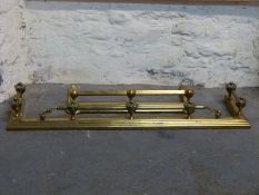 A brass fire kerb and another small example