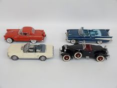 Five Danbury Mint diecast model cars comprising 1966 Ford Mustang, 1956 Ford Thunderbird,