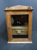 An oak smoker's cabinet
