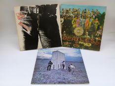 Approximately 25 albums including The Rolling Stones Sticky Fingers,