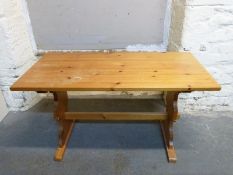A pine refectory or kitchen table,