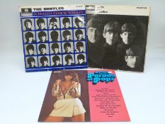 A box of over 50 records including The Beatles - A Hard Day's Night and with the Beatles