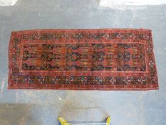 An Eastern wool rug or runner,