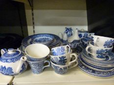 A collection of blue and white ceramics including 19thC sauces with faux Chinese marks,