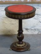 A 19thC style occasional table with gilt/brass mounts,