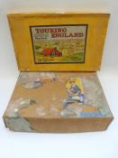 Bayko building block set together with a Geographia Touring England car game,