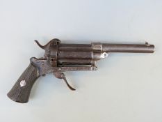 A 7mm six shot pinfire hammer action pepperbox revolver with 3.