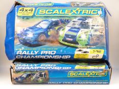 Two Scalextric Rally Pro Championship 1:32 scale model racing sets,
