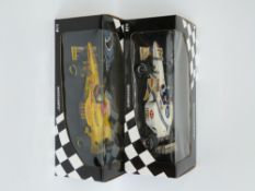 Two Minichamps 1:18 scale diecast model Formula 1 cars G.Fisichella Jordan 197 Peugeot and J.