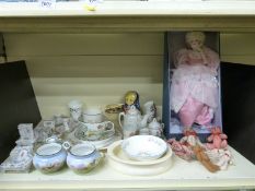 A collection of ceramics including boxed Royal Doulton Nisbet doll, children's bowls,