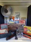 A quantity of vintage electrical appliances including irons, trouser presses, heater etc,