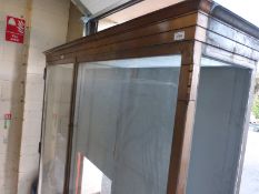 Ex Victoria & Albert Museum early 20thC two door glass display cabinet with bronzed frame,