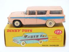Dinky Toys diecast model Nash Rambler with salmon body, blue stripe,