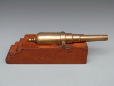 A 19thC bronze cannon with 10.