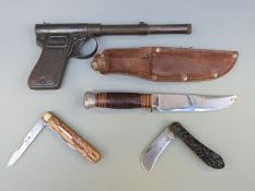 Diana air pistol and three various knives