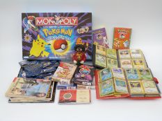 Over 300 Pokemon cards including shiny and high value examples together with empty card boxes,