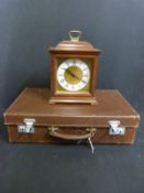 Vintage leather suitcase and Seth Thomas mantel clock