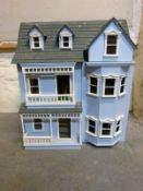 A dormered doll's house in the colonial American style architecture,