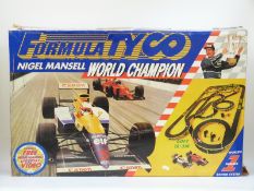 Formula Tyco Scaleextric style model racing set Nigel Mansell World Champion,