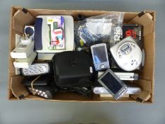 A quantity of various portable digital equipment to include media players, CD player,