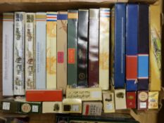 Twenty-three Lledo diecast model vehicle sets and twelve individual models including 24 carat gold