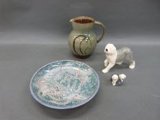 Royal Doulton Old English sheep dog, Beswick English sheep dog and a studio pottery dish and jug,