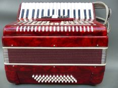Parrott 48 bass piano accordion with five treble couplers,
