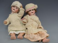 Two Heubach Koppeldorf bisque headed dolls both with open mouths, weighted eyes, brown hair,