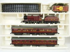 0 gauge Lima 4 J steam locomotive and two carriage set